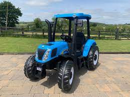 NEW HOLLAND 24V BATTERY OPERATED TRACTOR ALSO WITH R/C